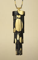 Suzan Rezac. Jewelry "Stretching Judy". Shakudo, 18K gold, shibuichi. Inlaid. 